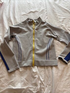 Women's Grey Jacket with Yellow Zip and Blue Accents